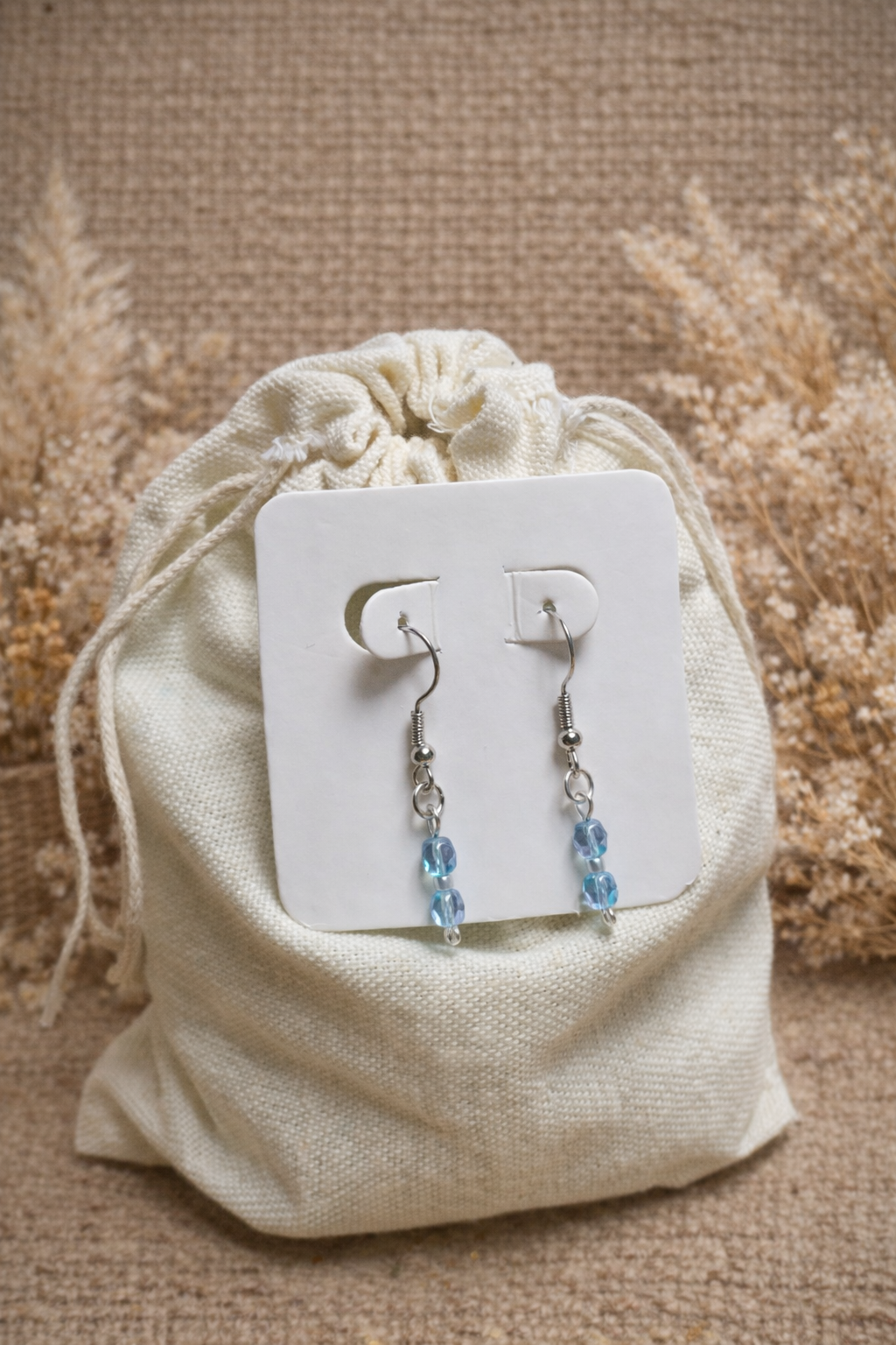 Boucles d’oreilles en perles facettées de verre argenté