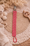 Attache-tétine fleur rouge – Fait main